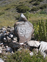 Om Carved into Stone