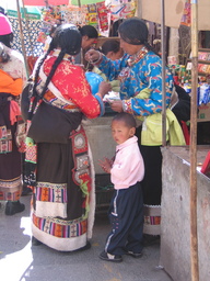 Tibetan Women Buy a Ball